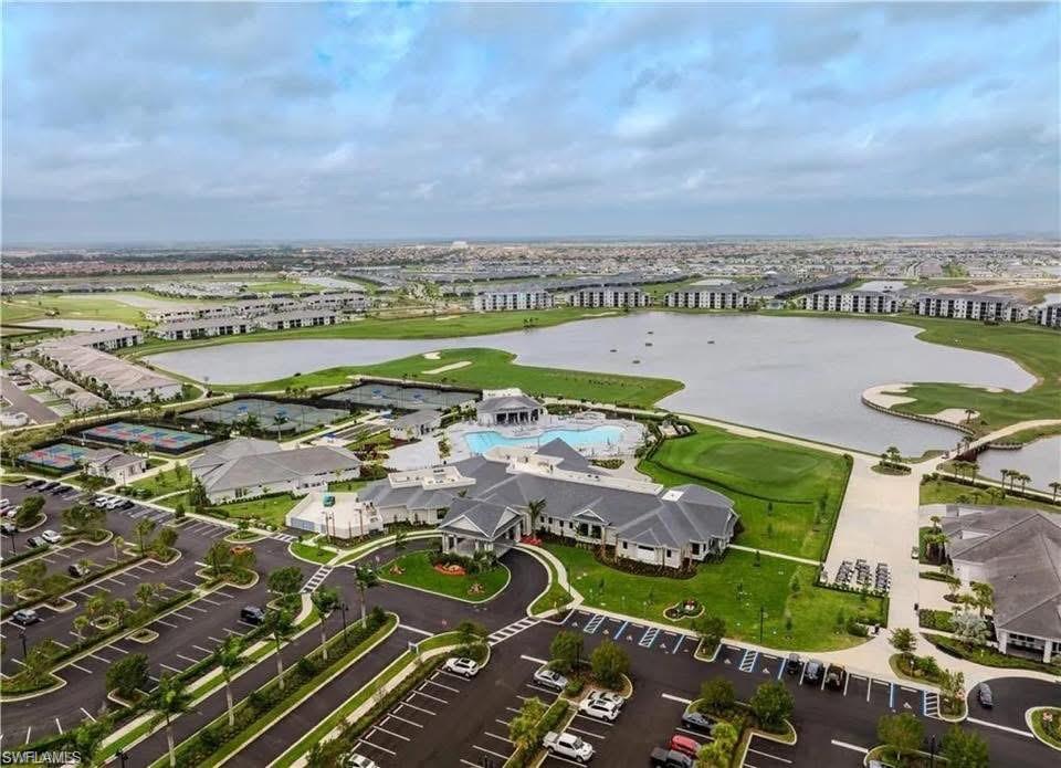 5491 Double Eagle Circle, Unit 3723 Ave Maria, FL 34142 - Photo 15 of 42 View of property location featuring a large body of water and a golf club