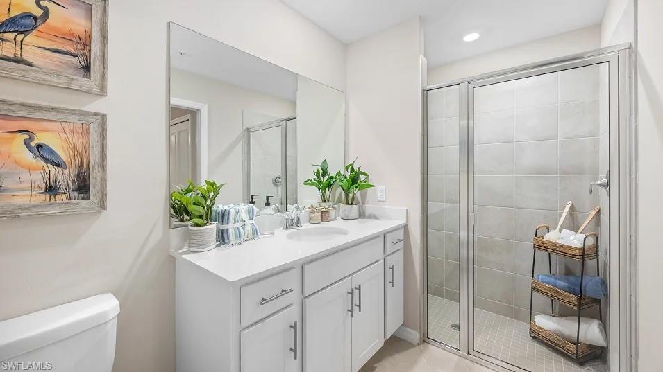 5491 Double Eagle Circle, Unit 3723 Ave Maria, FL 34142 - Photo 8 of 42 Full bathroom with a shower stall and vanity