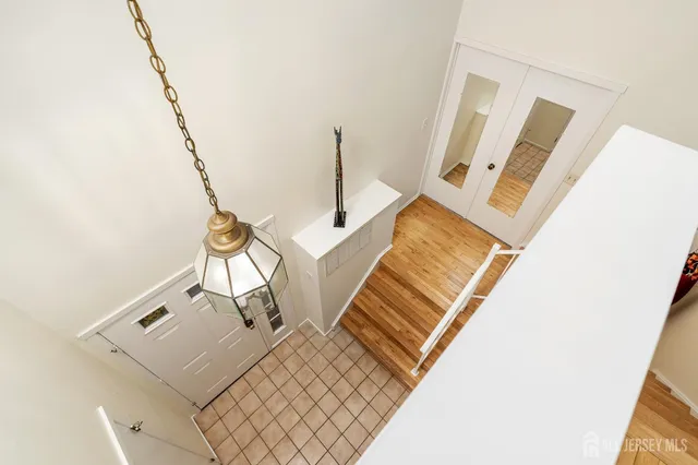 a view of living room with furniture and rug