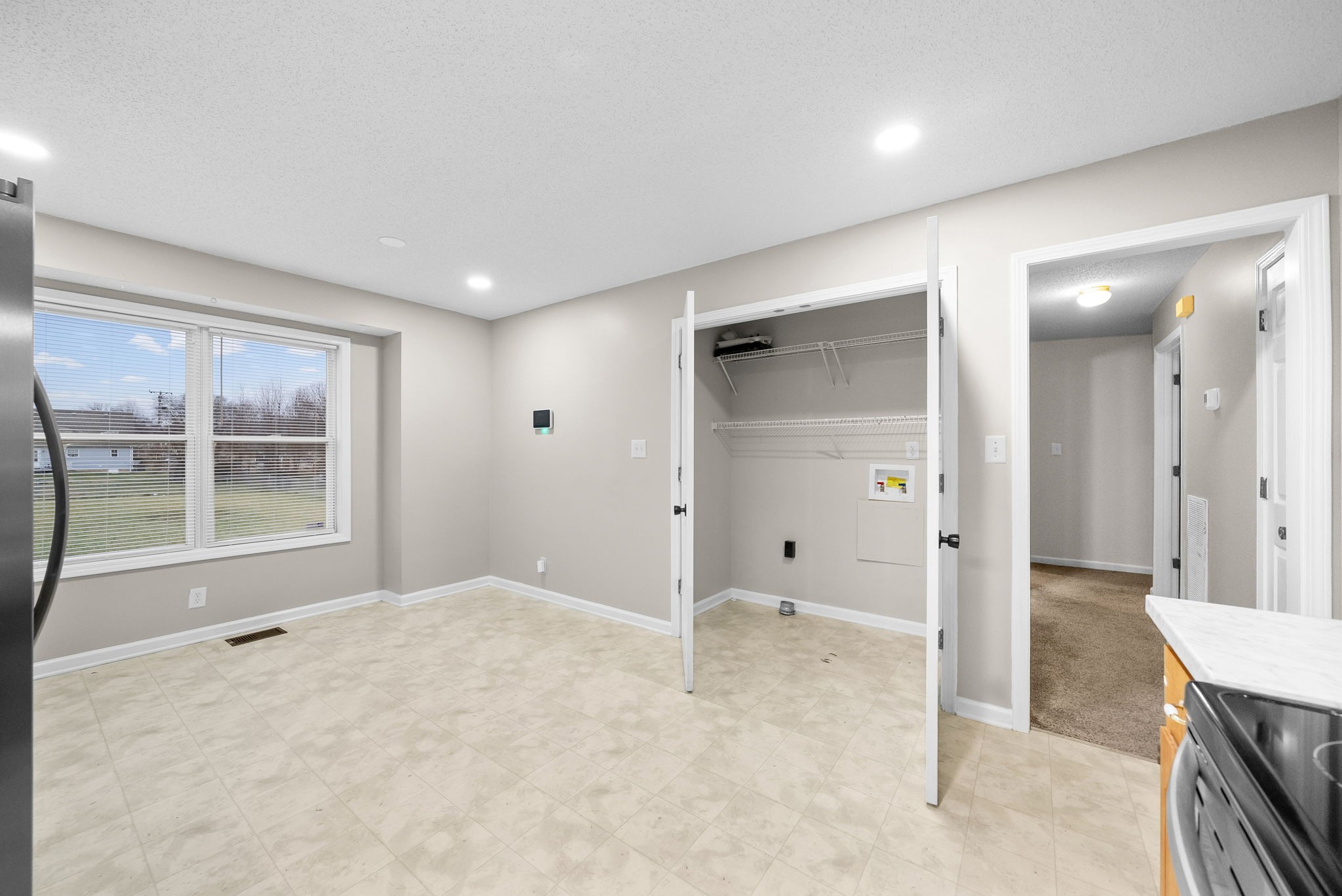1957 Timberline Circle Oak Grove, KY 42262 - Photo 13 of 29 an empty room with a empty space and windows