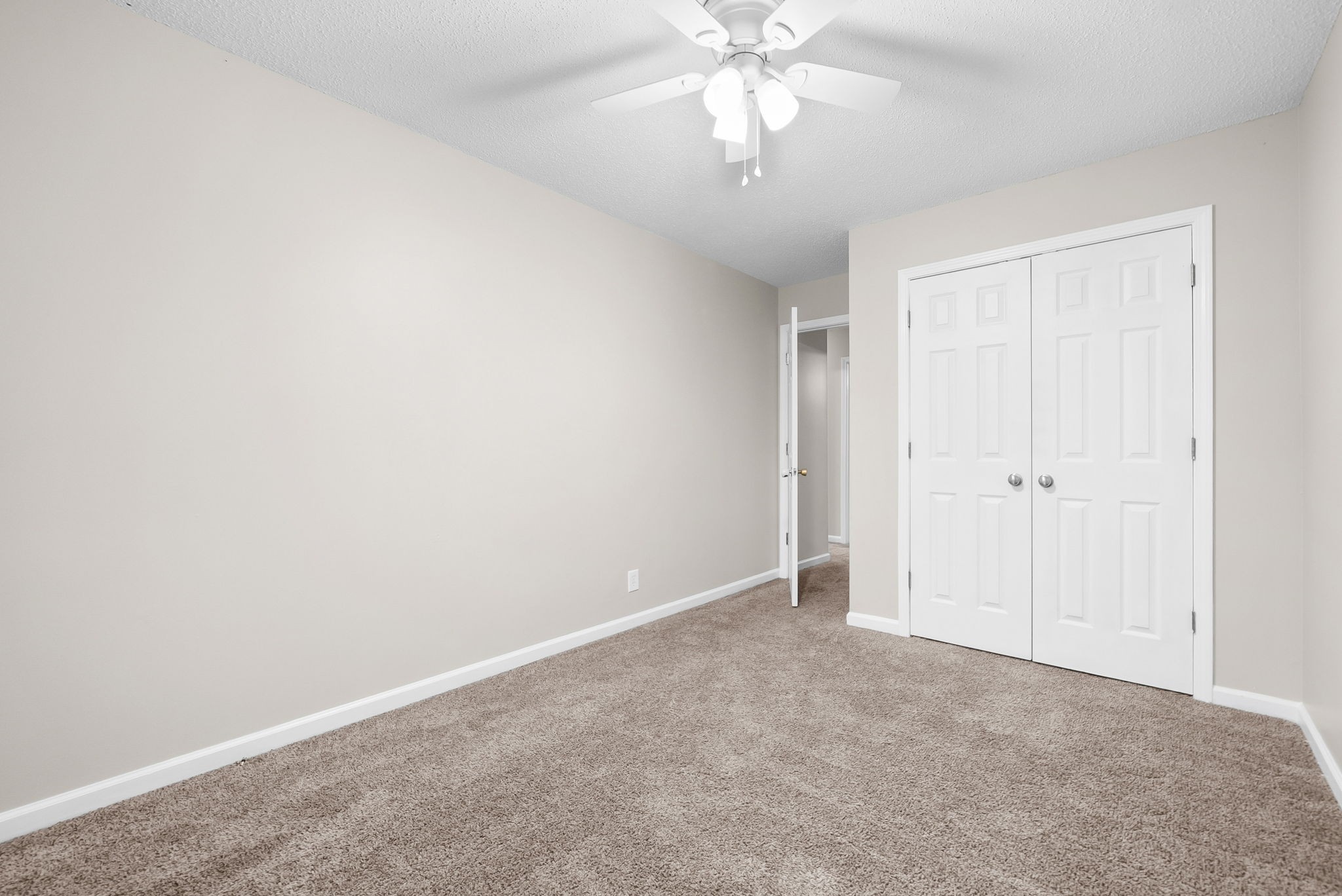 1957 Timberline Circle Oak Grove, KY 42262 - Photo 23 of 29 an empty room with a chandelier fan