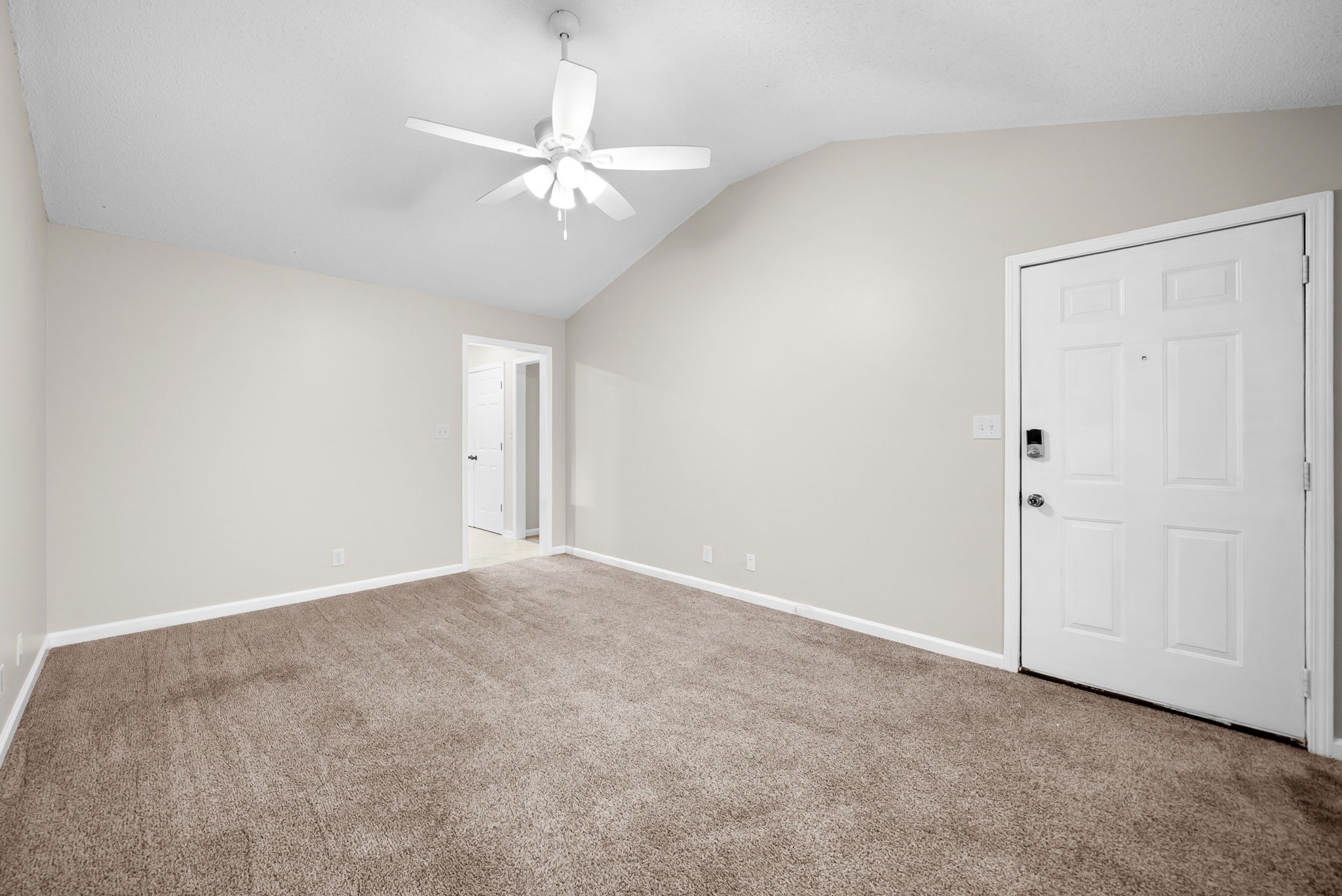 1957 Timberline Circle Oak Grove, KY 42262 - Photo 7 of 29 an empty room with a chandelier fan and closet area