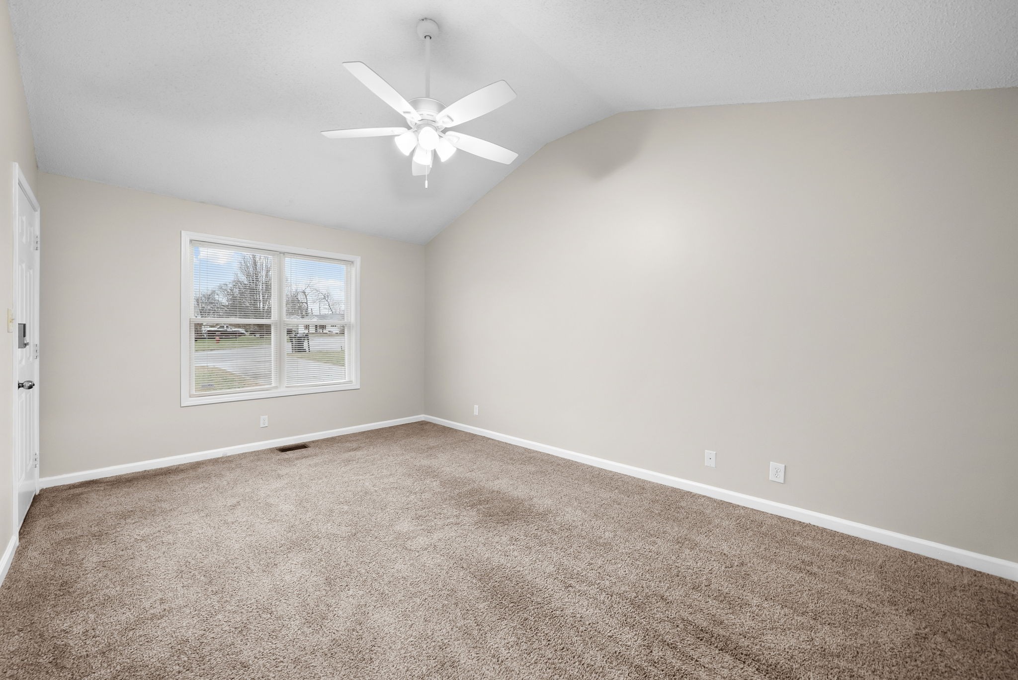 1957 Timberline Circle Oak Grove, KY 42262 - Photo 9 of 29 an empty room with windows and fan