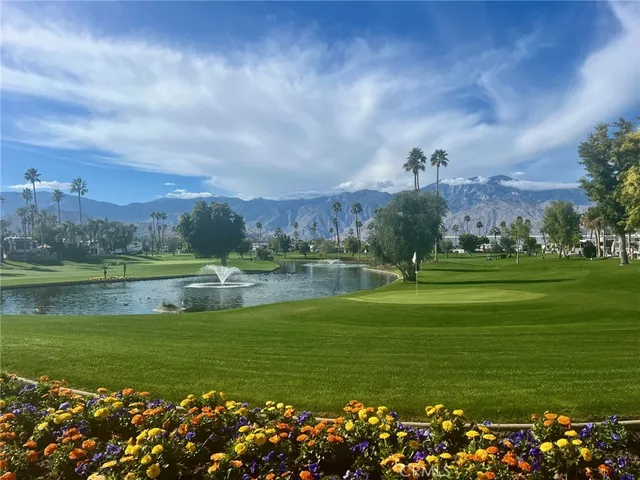 a view of a golf course with a lake