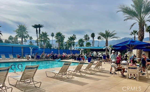 69411 Ramon Road, Unit 360 Cathedral City, CA 92234 - Photo 20 of 23 a area with lots of table and chairs
