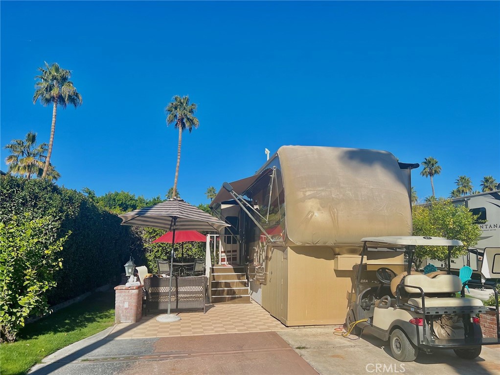 69411 Ramon Road, Unit 360 Cathedral City, CA 92234 - Photo 3 of 23 an outdoor space with furniture