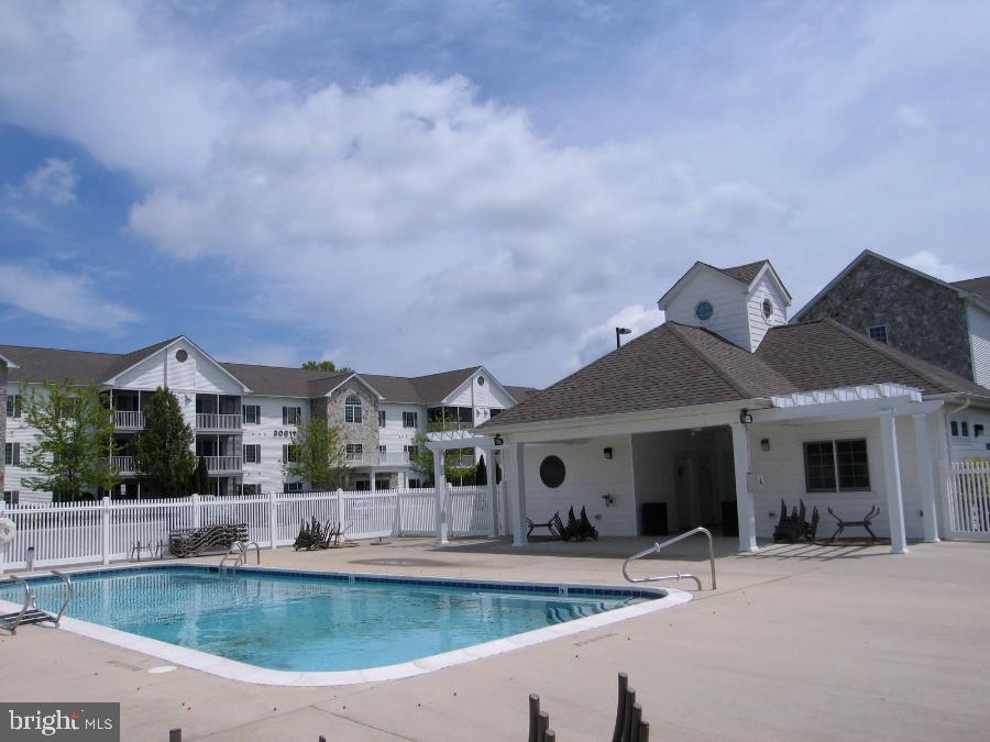 30611 Cedar Neck Road, Unit 2201 Ocean View, DE 19970 - Photo 36 of 60 Cedar Bay's community pool