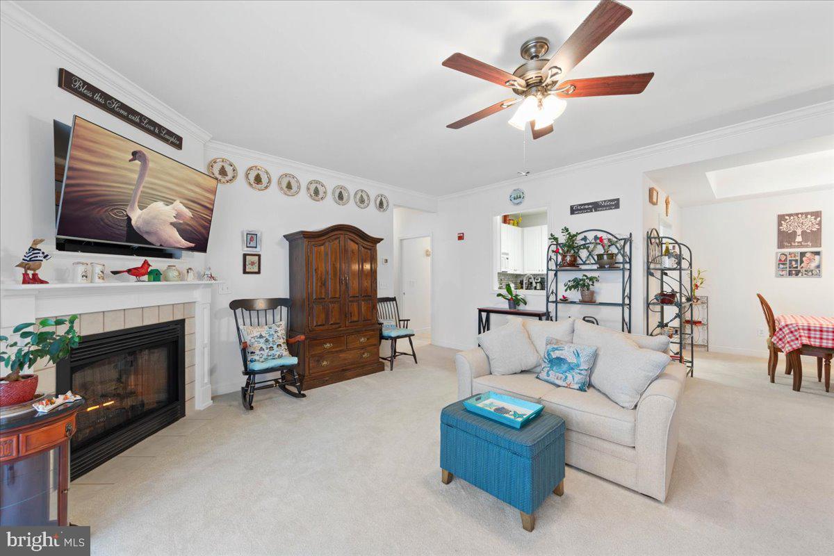 30611 Cedar Neck Road, Unit 2201 Ocean View, DE 19970 - Photo 4 of 60 Living room with fireplace
