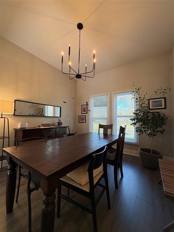 827 West Ellis Street Sherman, TX 75092 - Photo 5 of 9 a view of a dining room with furniture and wooden floor