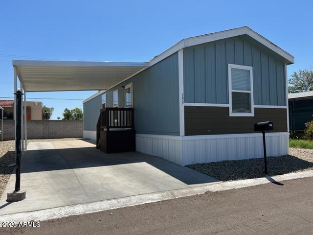 701 South Dobson Road, Unit 153 Mesa, AZ 85202 - Photo 1 of 36 EXTERIOR WITH COVERED PARKING AREA 153