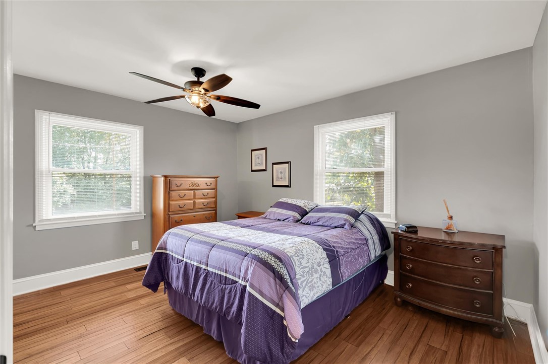 503 Stone Drive Anderson, SC 29625 - Photo 15 of 25 This inviting bedroom offers rich hardwood flooring and abundant natural light.