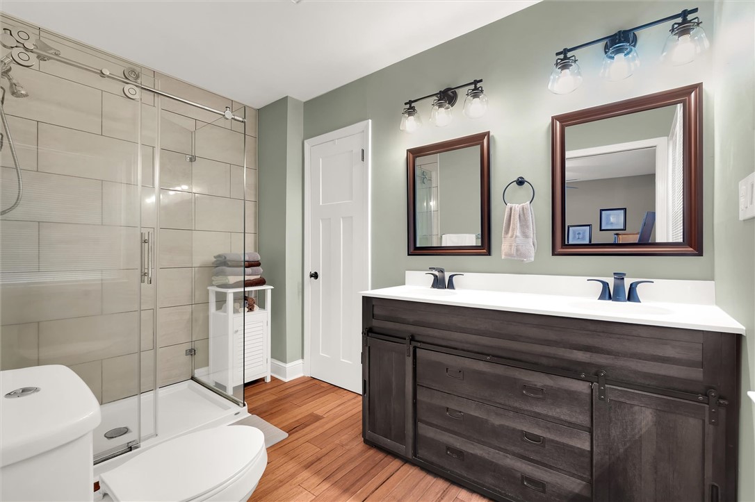 503 Stone Drive Anderson, SC 29625 - Photo 17 of 25 This bathroom features dual vanities and a spacious shower.