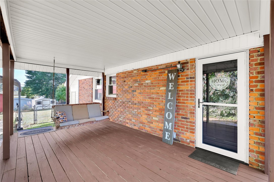 503 Stone Drive Anderson, SC 29625 - Photo 22 of 25 This inviting porch offers a perfect spot for outdoor relaxation and quiet enjoyment.