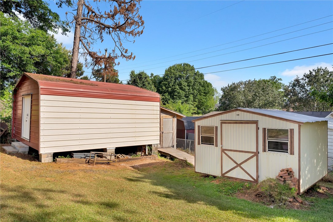 503 Stone Drive Anderson, SC 29625 - Photo 25 of 25 This property offers a spacious yard with two versatile outbuildings, perfect for various uses.
