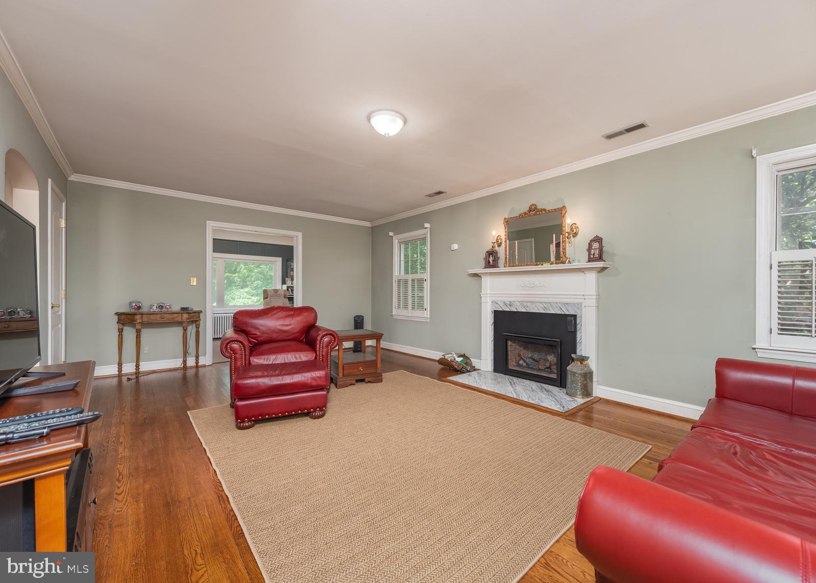 211 Patuxent Road Laurel, MD 20707 - Photo 11 of 46 Living room with gas fireplace view 2