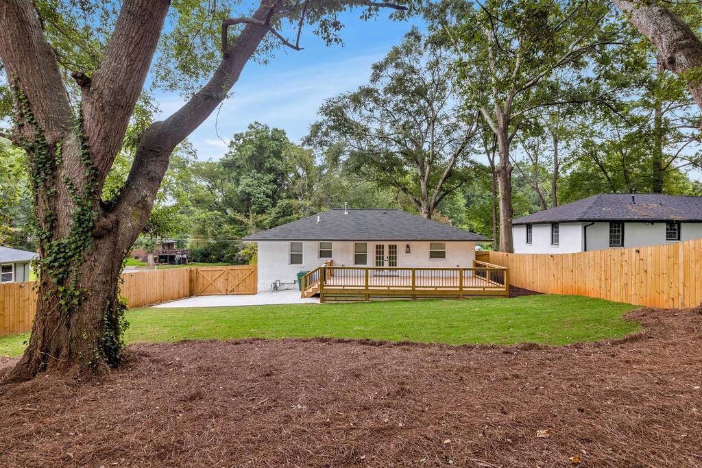 2219 Sharon Way Decatur, GA 30032 - Photo 21 of 23 a house that has a tree in front of it