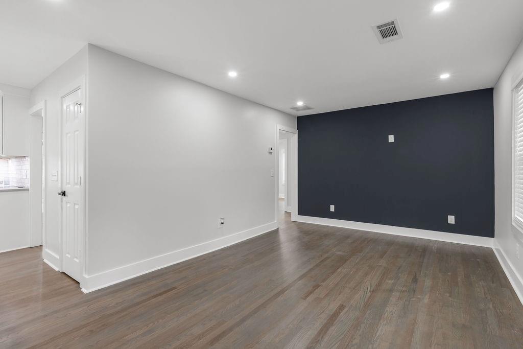 2219 Sharon Way Decatur, GA 30032 - Photo 3 of 23 a view of an empty room with wooden floor