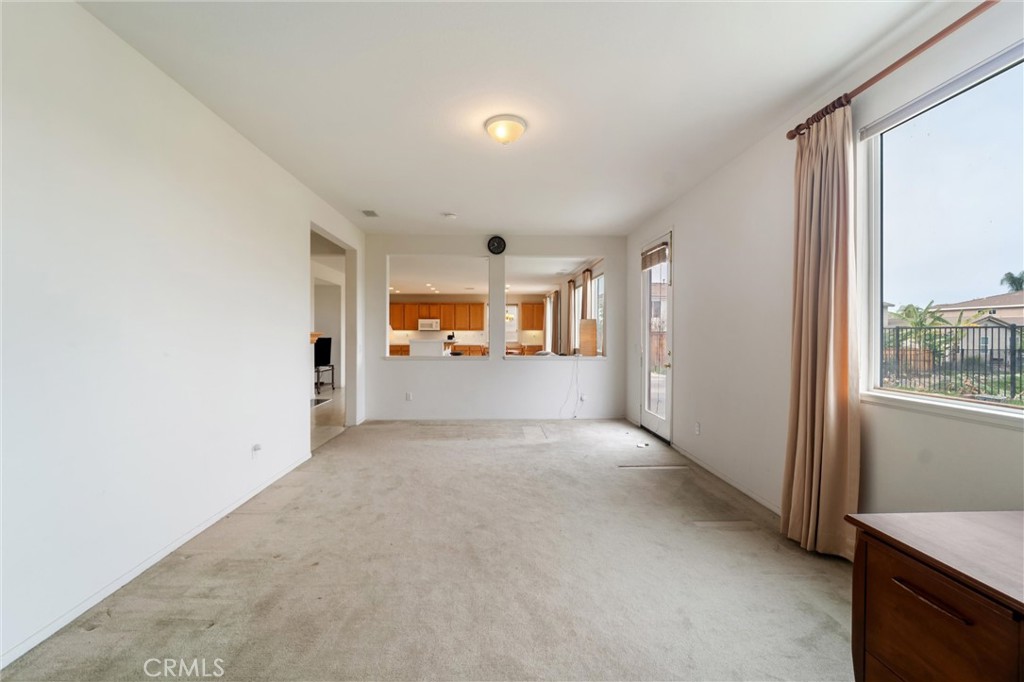17191 Greentree Drive Riverside, CA 92503 - Photo 18 of 53 a view of a big room with windows and cabinet