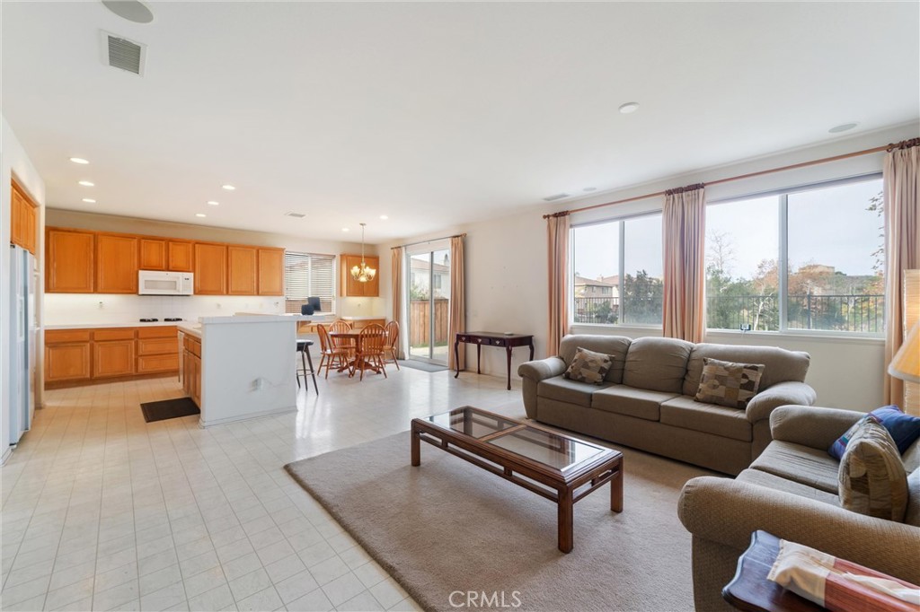 17191 Greentree Drive Riverside, CA 92503 - Photo 20 of 53 a living room with furniture and a large window