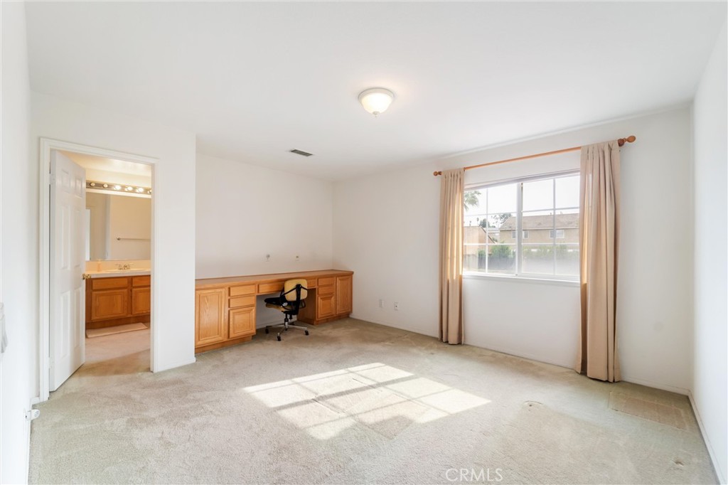 17191 Greentree Drive Riverside, CA 92503 - Photo 32 of 53 a view of room with furniture and a window
