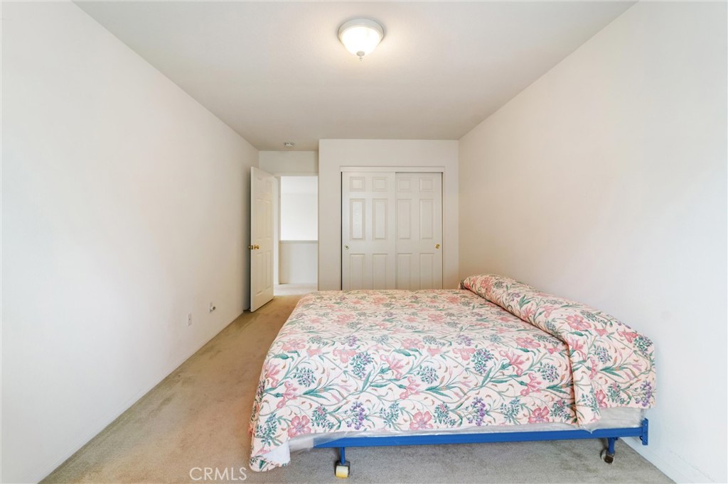 17191 Greentree Drive Riverside, CA 92503 - Photo 34 of 53 a bedroom with a bed and a window