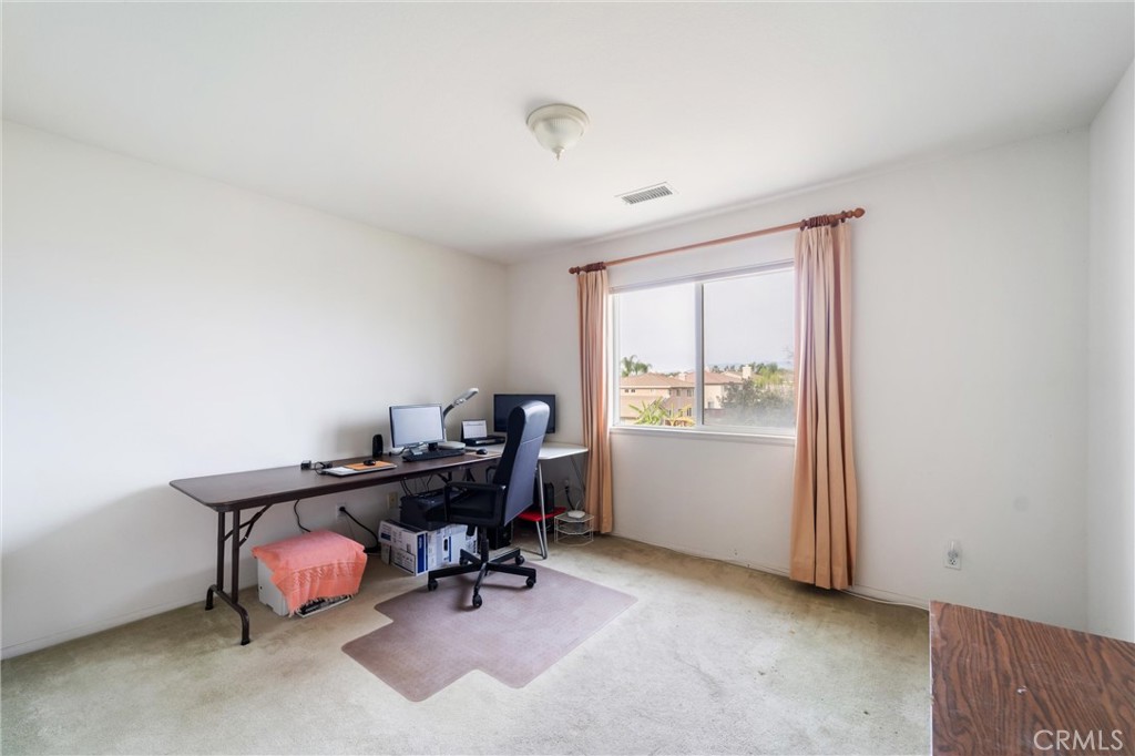 17191 Greentree Drive Riverside, CA 92503 - Photo 38 of 53 a view of a workspace with furniture and a window