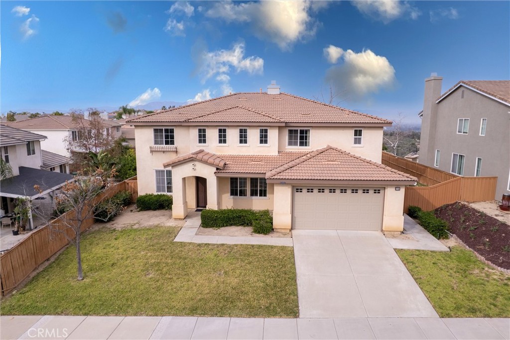 17191 Greentree Drive Riverside, CA 92503 - Photo 47 of 53 a front view of a house with a yard