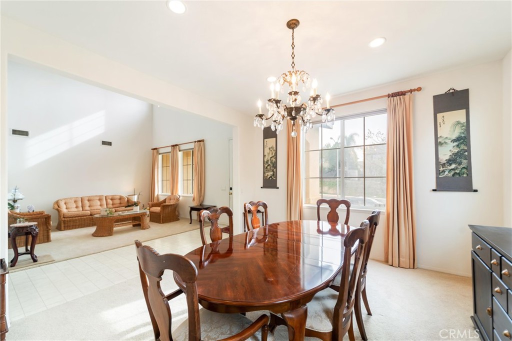 17191 Greentree Drive Riverside, CA 92503 - Photo 9 of 53 a view of a dining room with furniture window and outside view