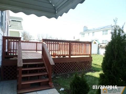 554 New Dover Road Colonia, NJ 07067 - Photo 3 of 13 a view of a balcony with wooden floor