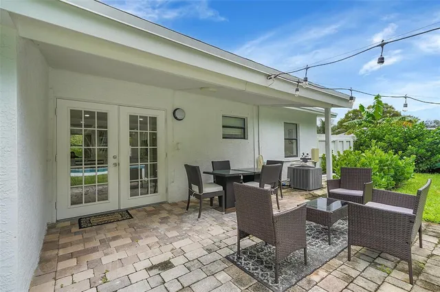 a view of a garden with an outdoor space