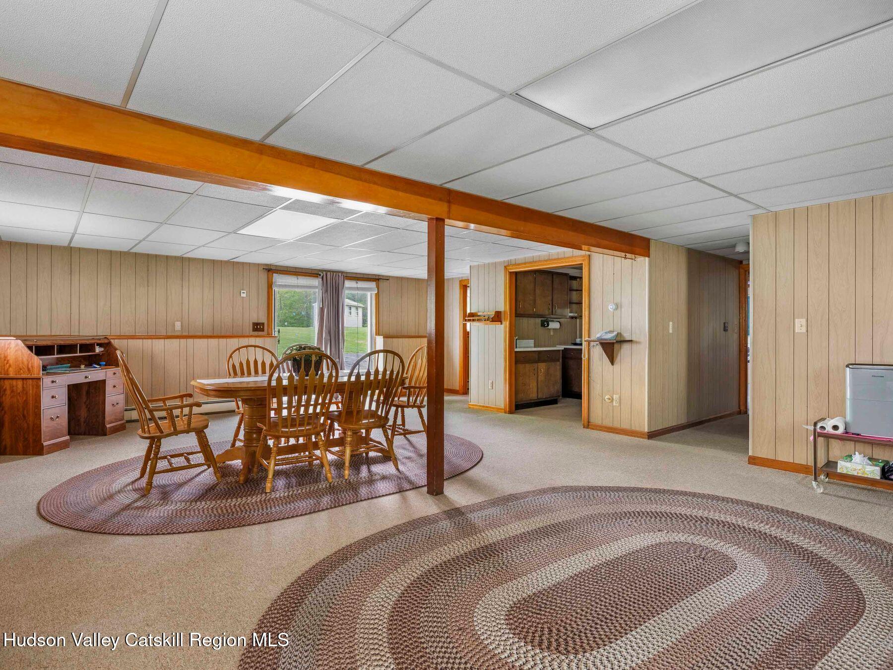 104 New Paltz Road Highland, NY 12528 - Photo 27 of 43 a living room with furniture and kitchen view