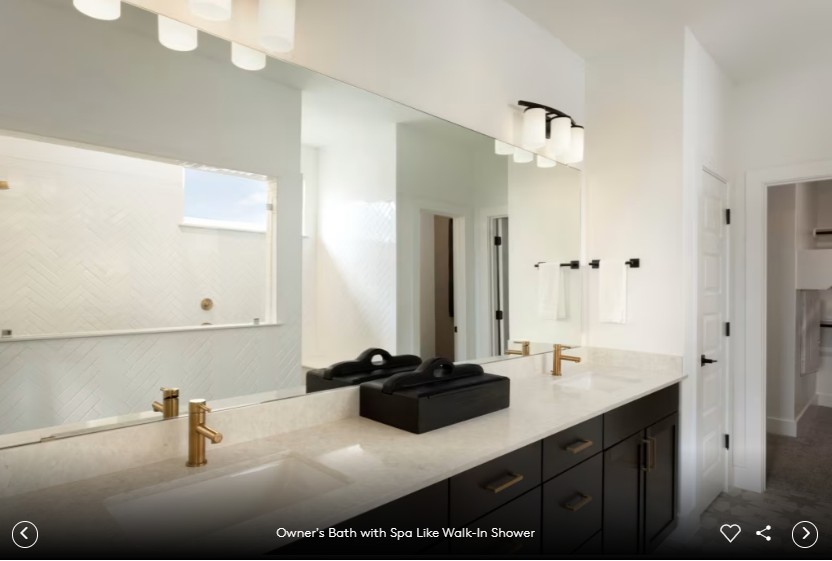 6408 Cypress Ranch Boulevard Spicewood, TX 78669 - Photo 11 of 13 a bathroom with a sink and a mirror