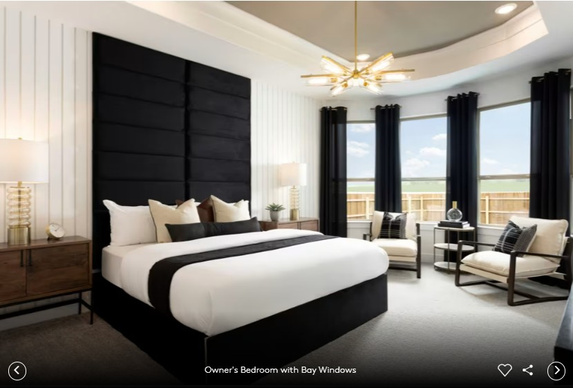 6408 Cypress Ranch Boulevard Spicewood, TX 78669 - Photo 10 of 13 a bedroom with bed and large windows