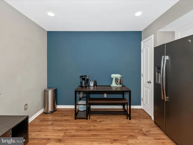 a view of a workspace with furniture