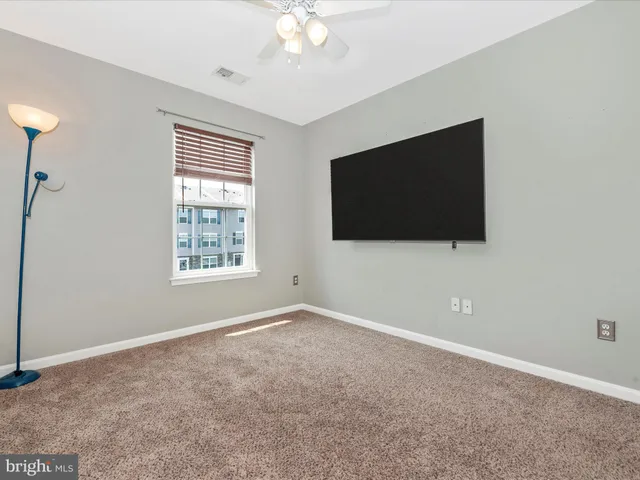a view of a livingroom with a flat screen tv
