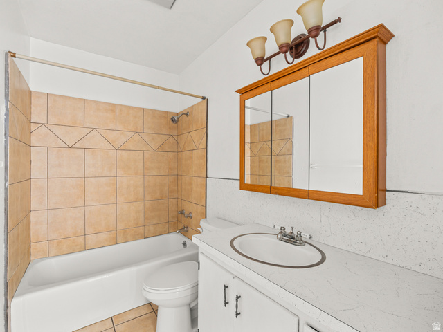 460 200 South Provo, UT 84606 - Photo 26 of 66 Full bath featuring vanity, bathing tub / shower combination, and light tile patterned floors