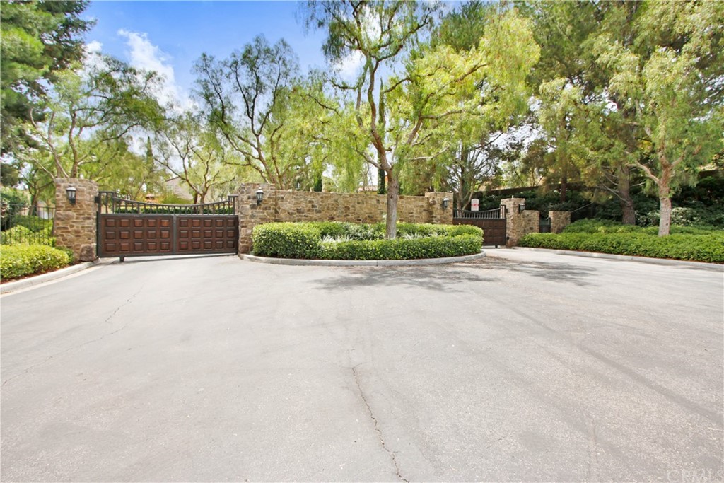 54 Clouds View Irvine, CA 92603 - Photo 31 of 39 a view of a road with a house in the background