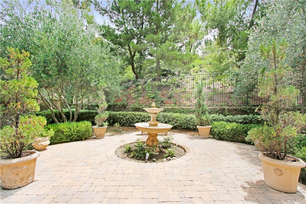 54 Clouds View Irvine, CA 92603 - Photo 8 of 39 a view of a back yard from a patio