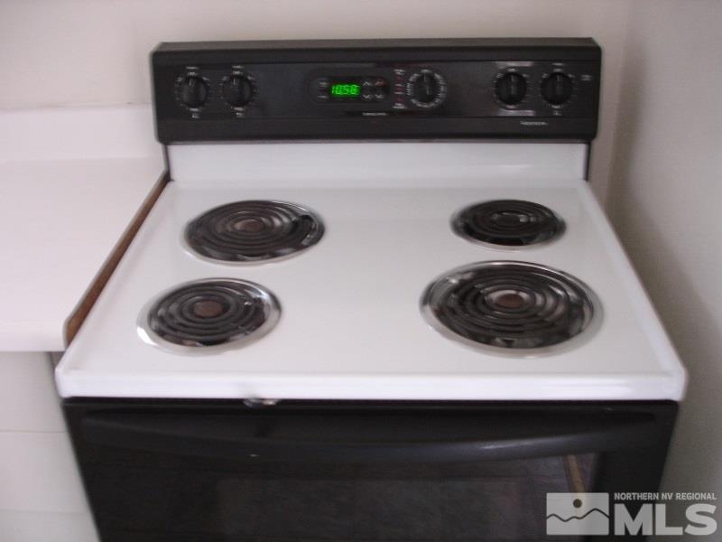 911 Bates Avenue Reno, NV 89502 - Photo 7 of 10 a close view of a stove and microwave