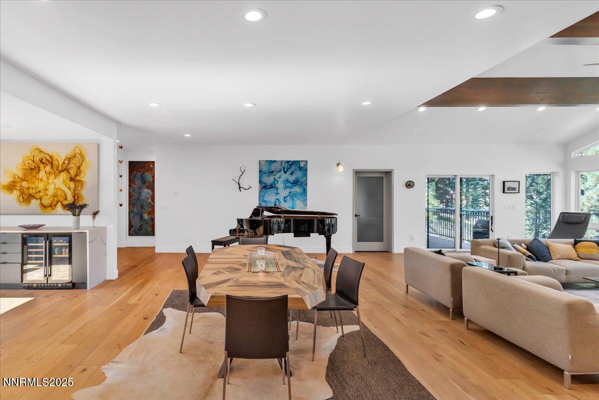1262 Hidden Woods Drive Zephyr Cove, NV 89448 - Photo 12 of 81 a living room with furniture kitchen view and a large window