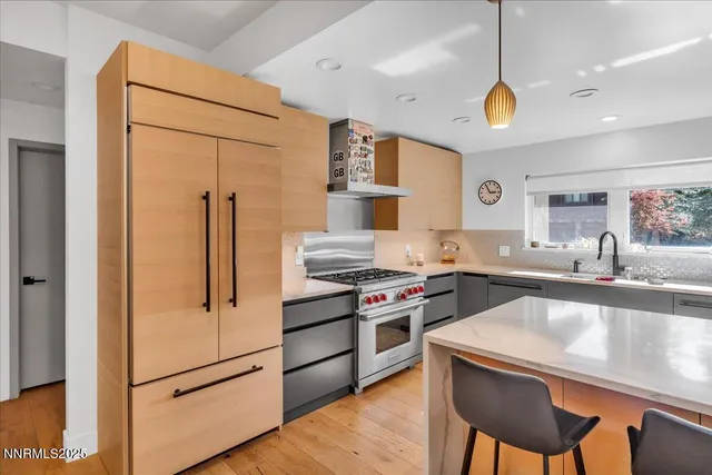 a kitchen with a stove and a microwave