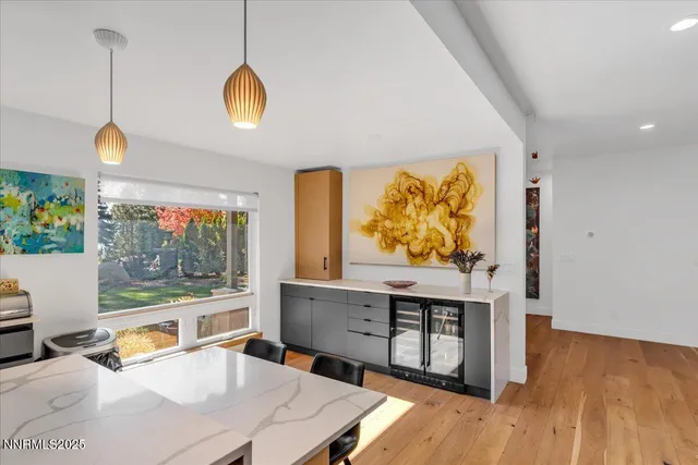 a view of a dining room with furniture window and outside view