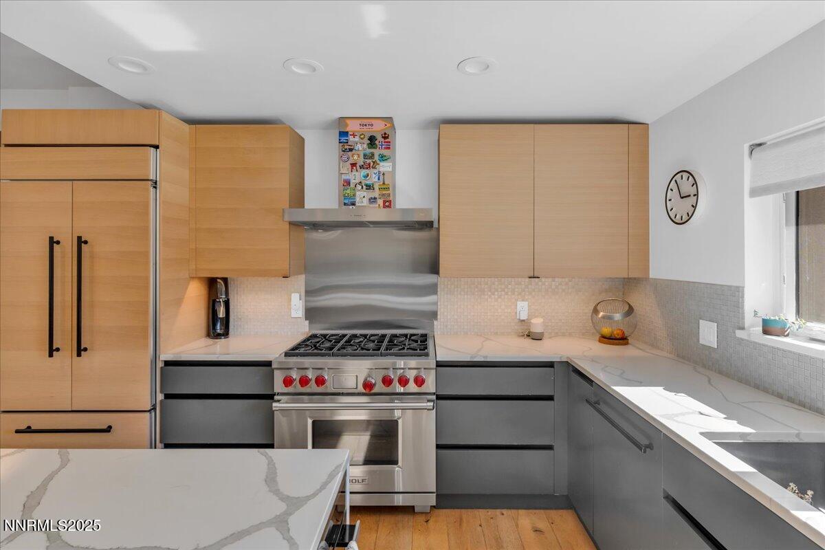 1262 Hidden Woods Drive Zephyr Cove, NV 89448 - Photo 20 of 81 a kitchen with a stove and a microwave