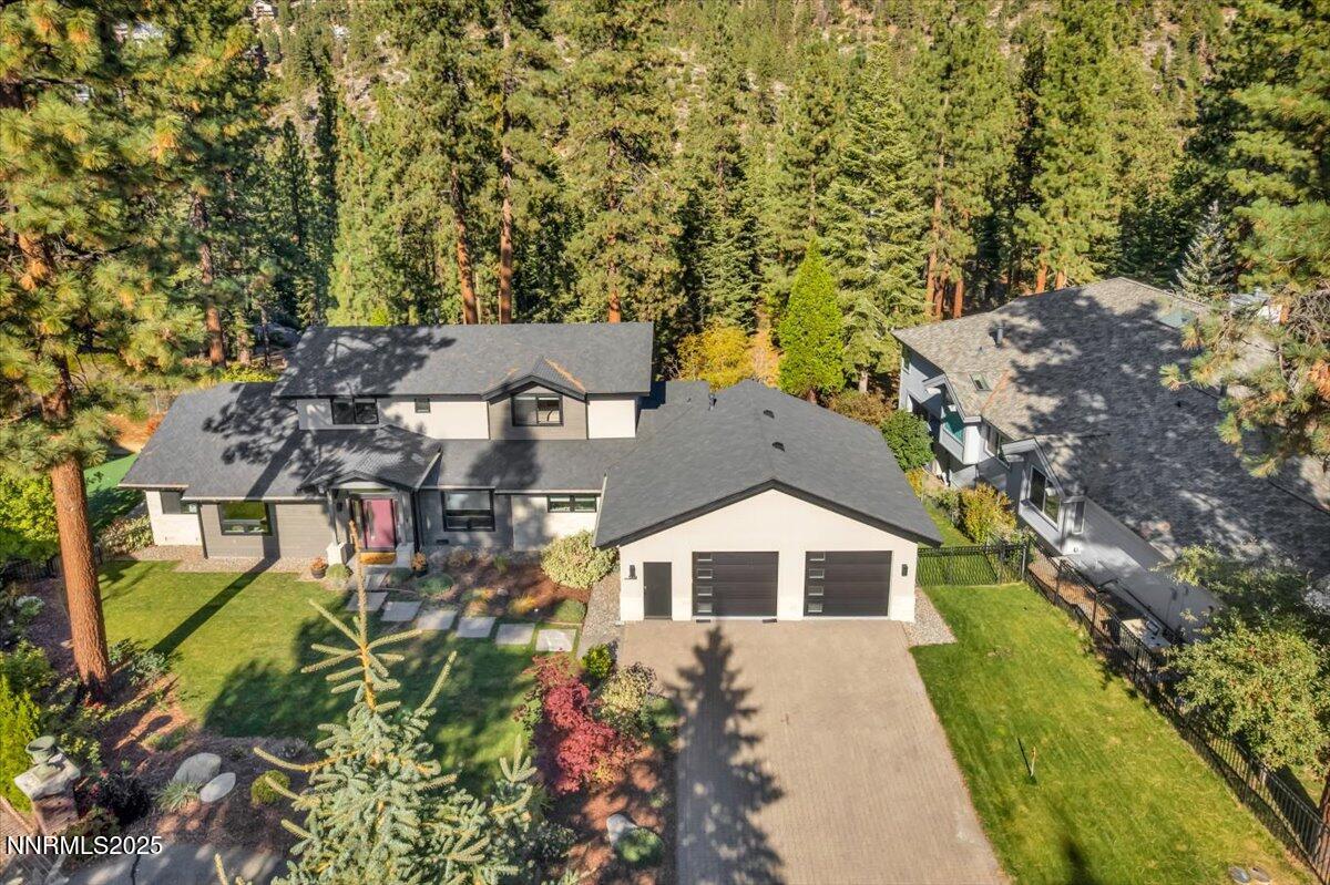1262 Hidden Woods Drive Zephyr Cove, NV 89448 - Photo 2 of 81 an aerial view of a house