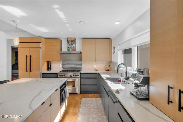 a bedroom with a bed and glass window