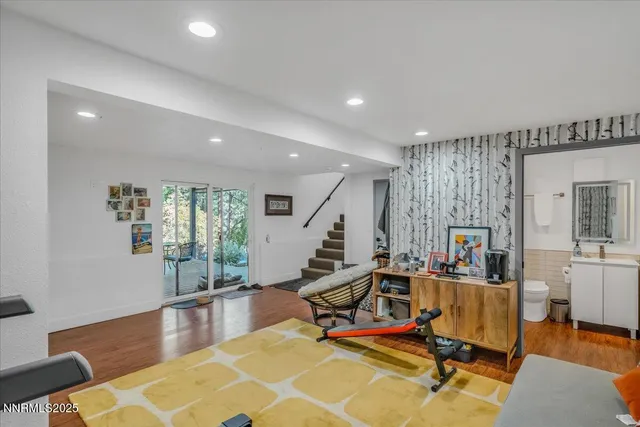 a view of a house with a backyard porch and sitting area