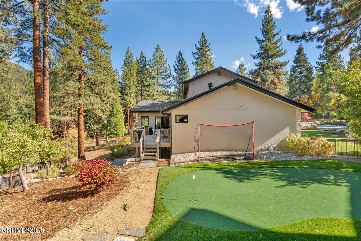 1262 Hidden Woods Drive Zephyr Cove, NV 89448 - Photo 57 of 81 a view of a house with backyard and sitting area