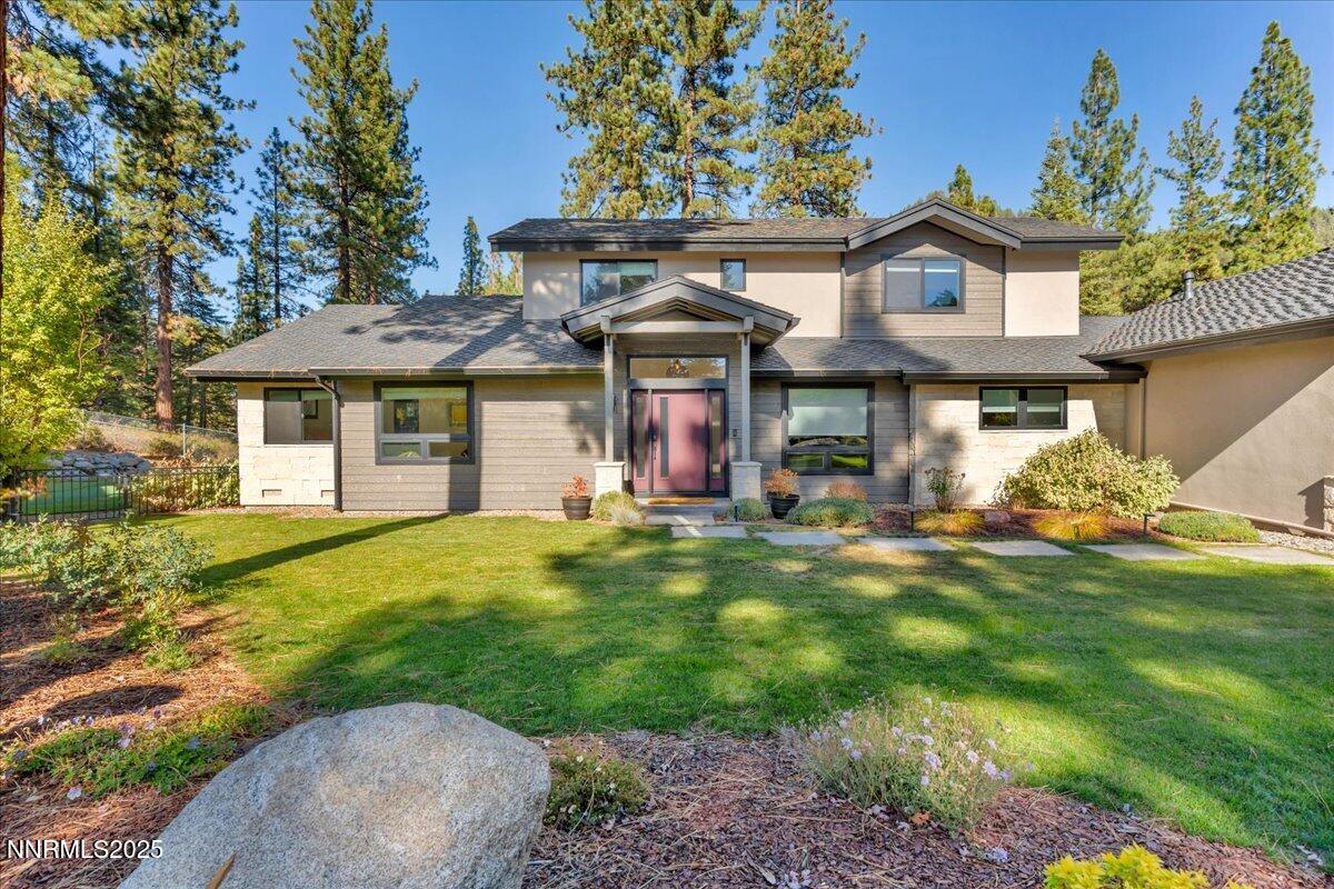 1262 Hidden Woods Drive Zephyr Cove, NV 89448 - Photo 72 of 81 a front view of a house with a garden