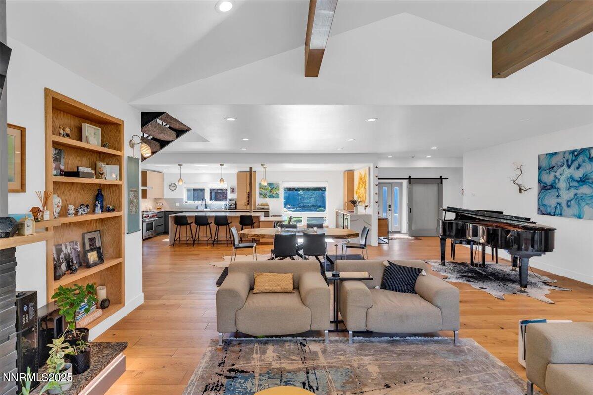 1262 Hidden Woods Drive Zephyr Cove, NV 89448 - Photo 8 of 81 a living room with furniture and a book shelf
