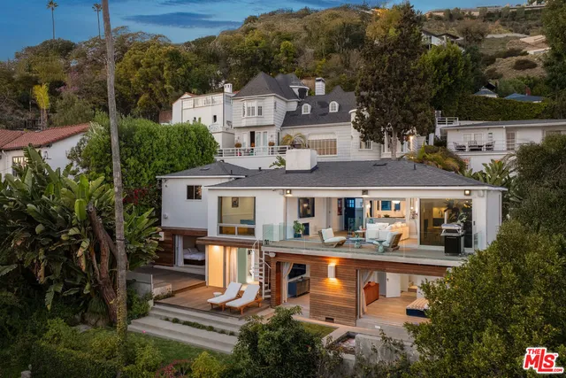 a living room with fireplace